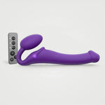Strap-On-Me Remote Control Vibrating Bendable Strap-on in purple silicone, shown with wireless remote control
