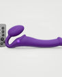 Strap-On-Me Remote Control Vibrating Bendable Strap-on in purple silicone, shown with wireless remote control
